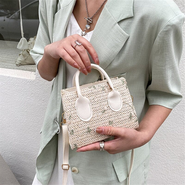 Xiava | Woven Straw Bag with Flower Detail