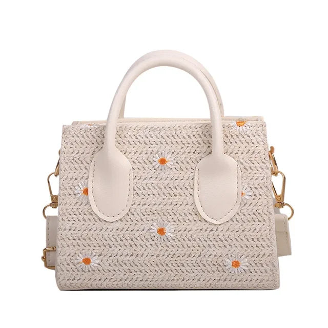 Xiava | Woven Straw Bag with Flower Detail